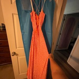 Pink/peach colored dress, not sure what brand! Size 10. Paid 300.